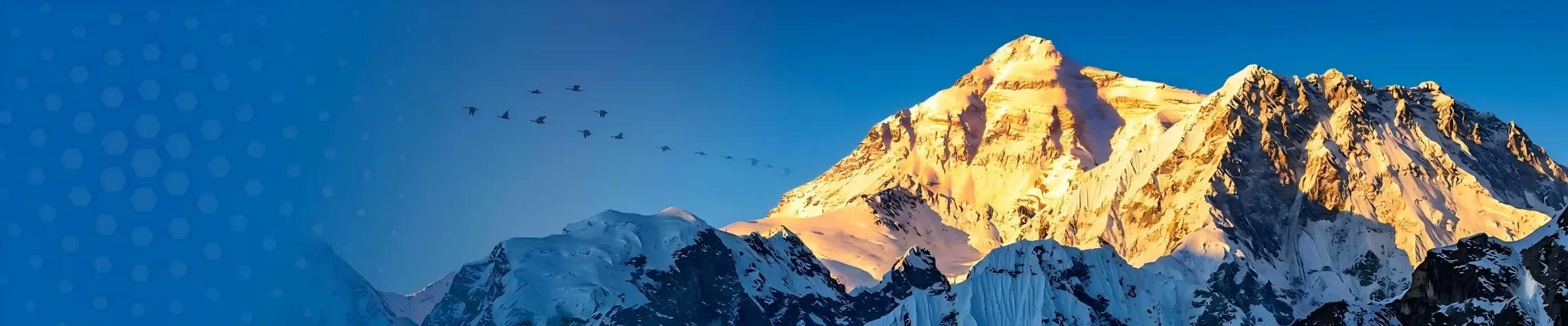 Snow mountain range at sunrise, standing in for power delivered to remote sites